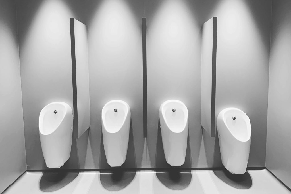 Urinal in a Johannesburg commercial restroom mall maintained by a trusted plumber for commercial plumbing services