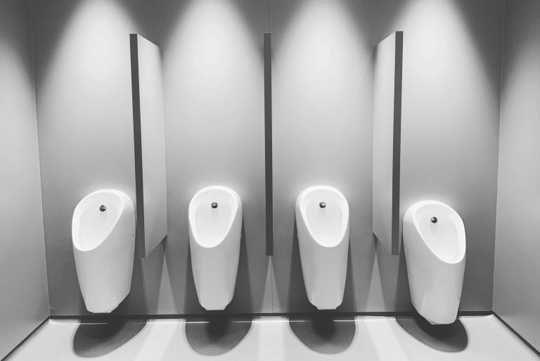 Urinal in a Johannesburg commercial restroom mall maintained by a trusted plumber for commercial plumbing services